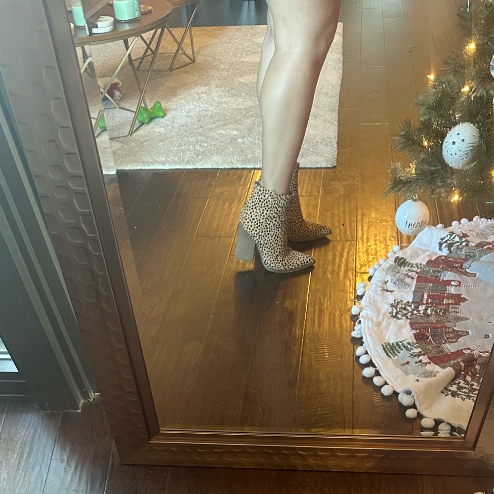 Heeled cheetah print ankle boots